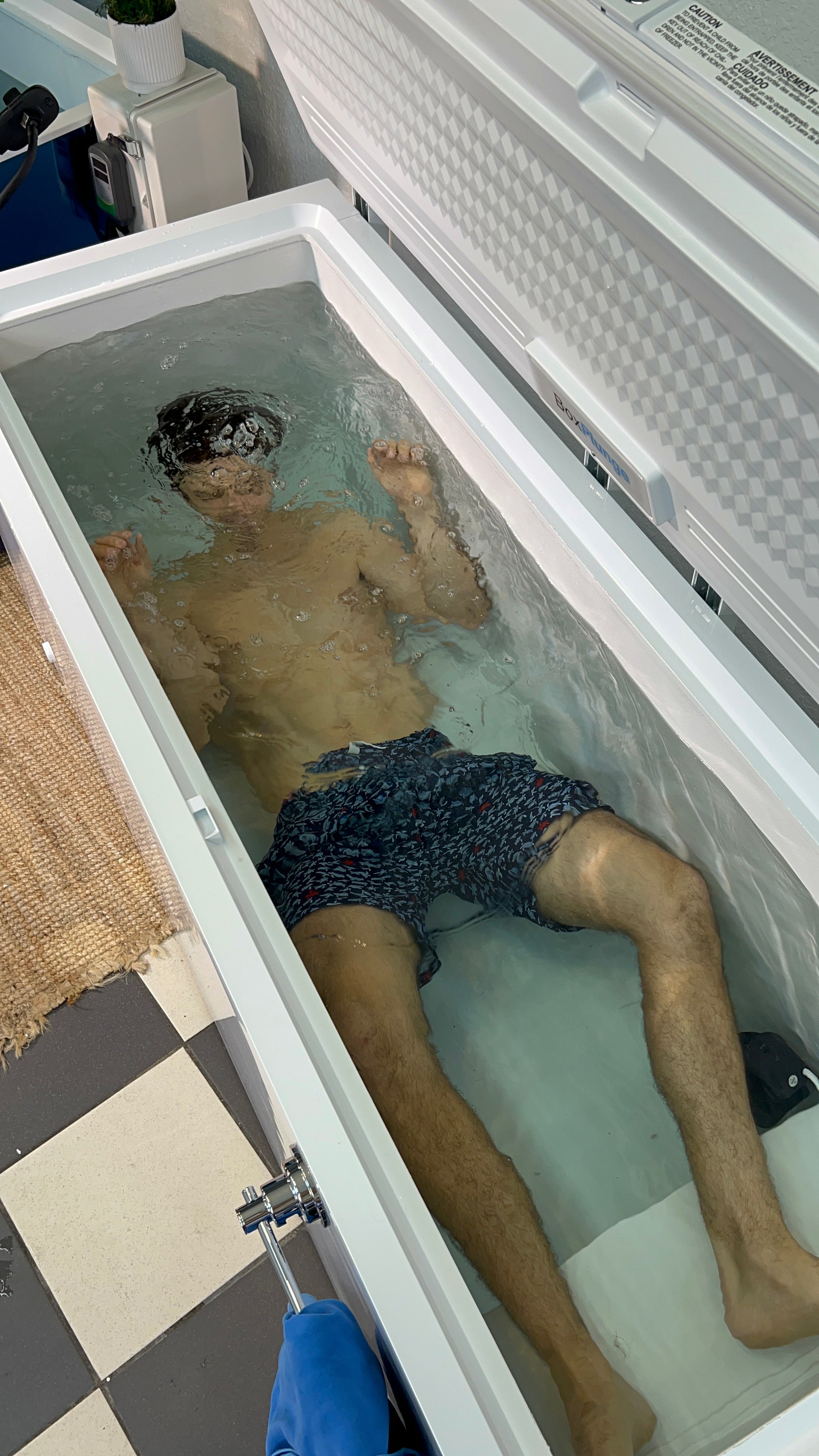 Person Using Chest Freezer Affordable Chest Freezer Cold Plunges | TemperaCure